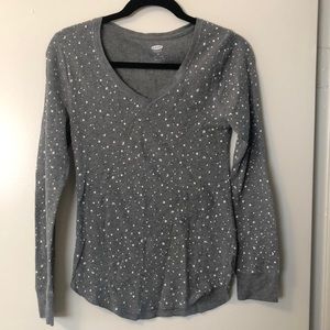 Grey stretchy top with little polka dots and planets